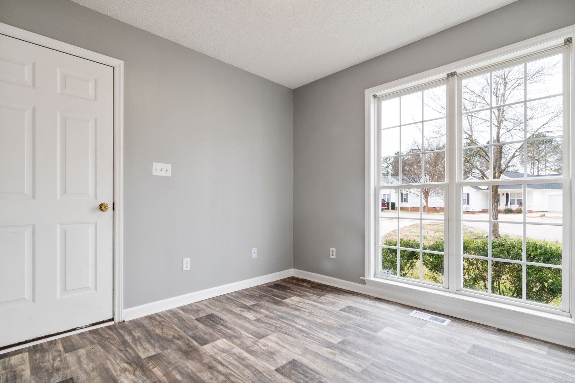 Bright finished interior with large windows