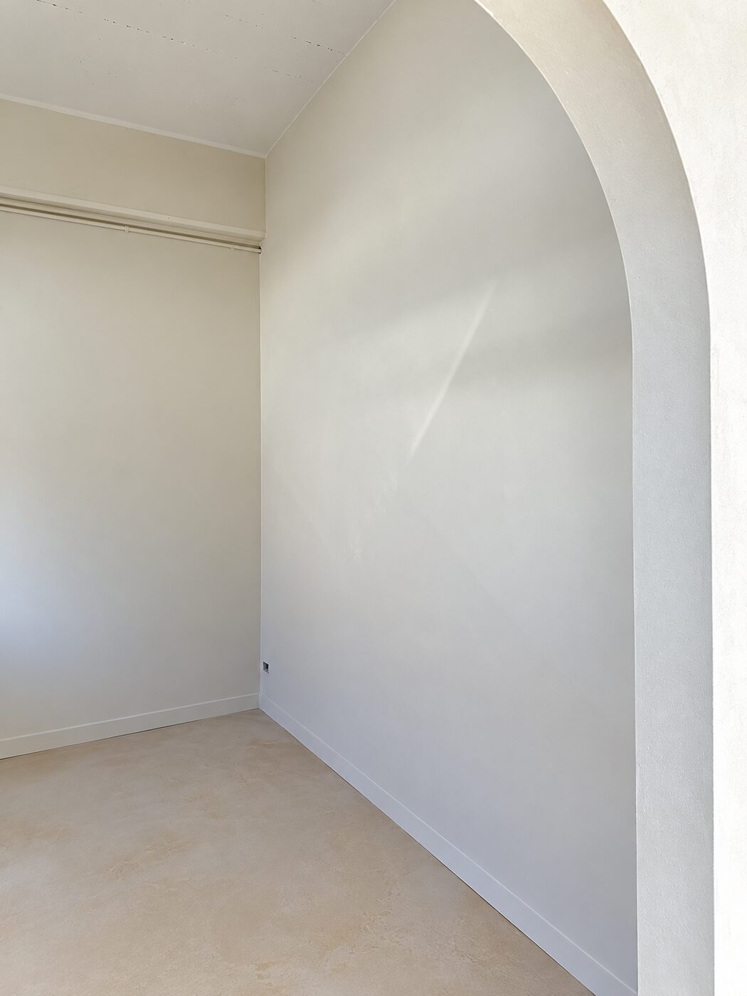 Smooth plastered arch and wall catching the afternoon light, No.1 Plastering and Painting